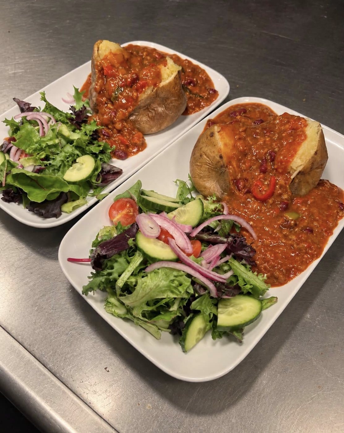 Freshly plated mains served with salad